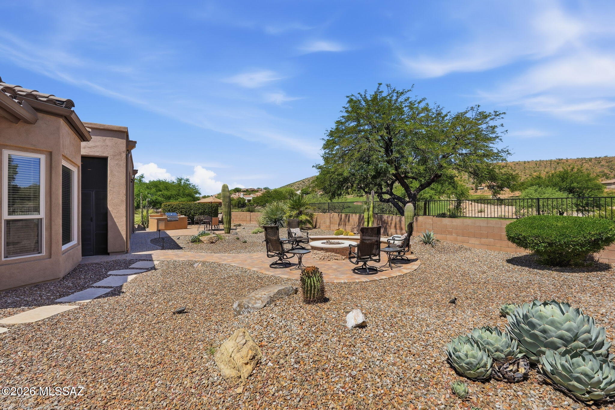 66162 East Box Elder Road Tucson, AZ 85739 - Photo 22 of 42 Gas fire pit with views of golf course