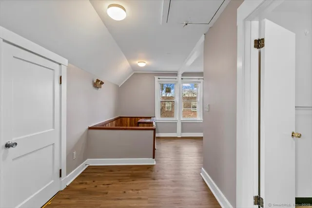 a view of livingroom with hardwood floor and a ceiling fan