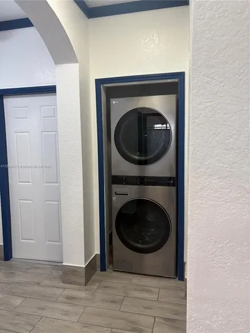 a close up view of a washer and dryer in a utility room