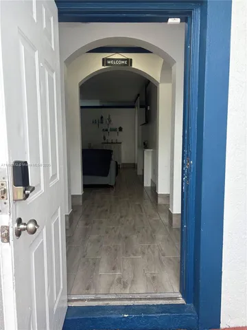 a view of livingroom with furniture and natural light