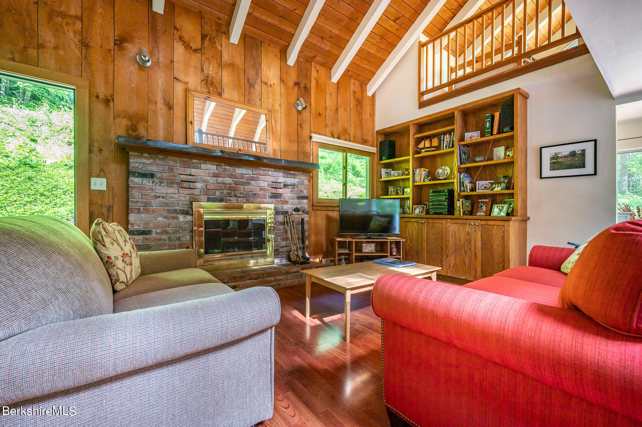 9 Pixley Hill Road West Stockbridge, MA 01236 - Photo 15 of 37 a living room with furniture a fireplace and a large window