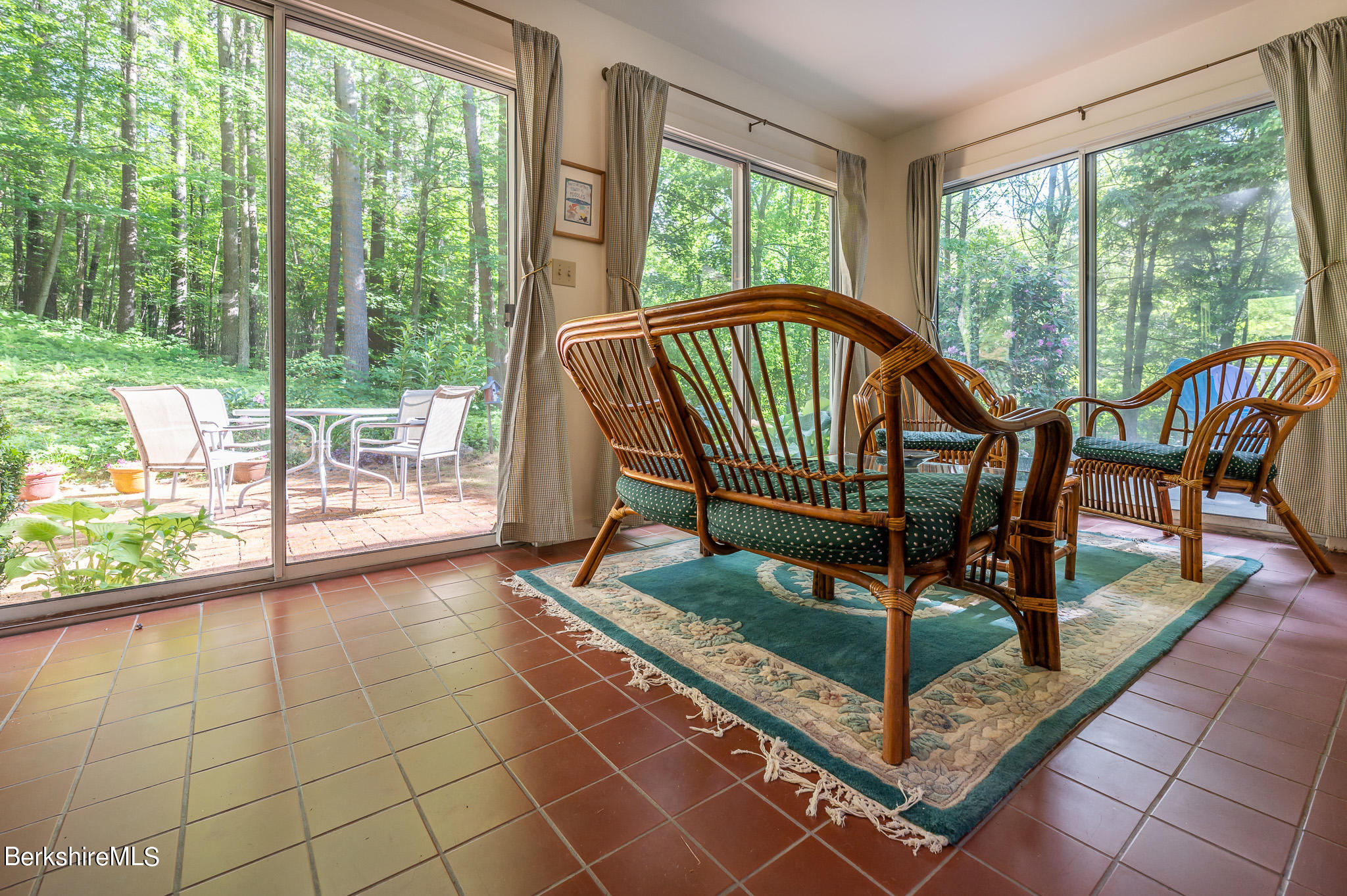 9 Pixley Hill Road West Stockbridge, MA 01236 - Photo 17 of 37 a view of a porch with furniture and a yard