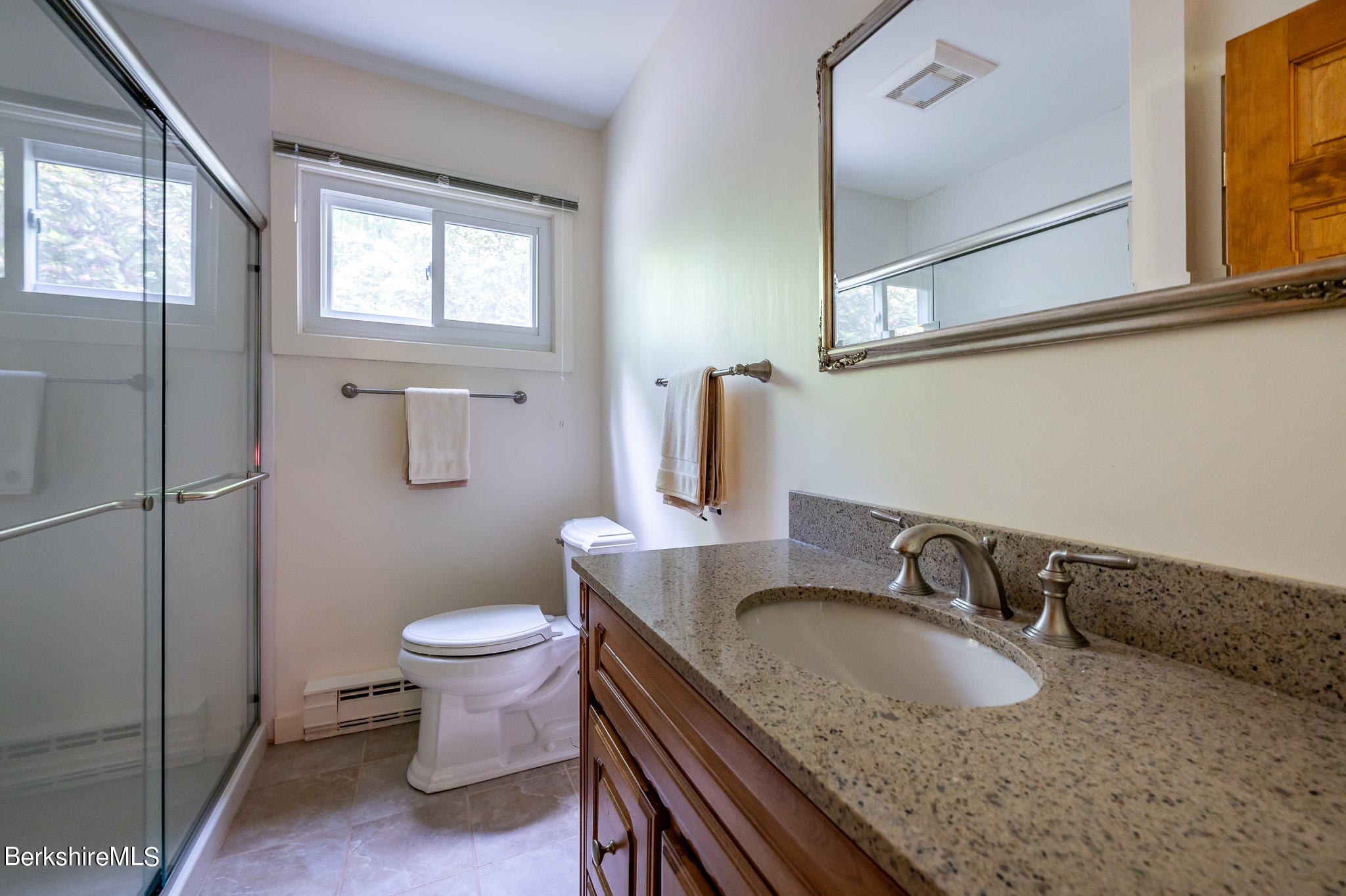 9 Pixley Hill Road West Stockbridge, MA 01236 - Photo 20 of 37 a bathroom with a granite countertop toilet sink and mirror