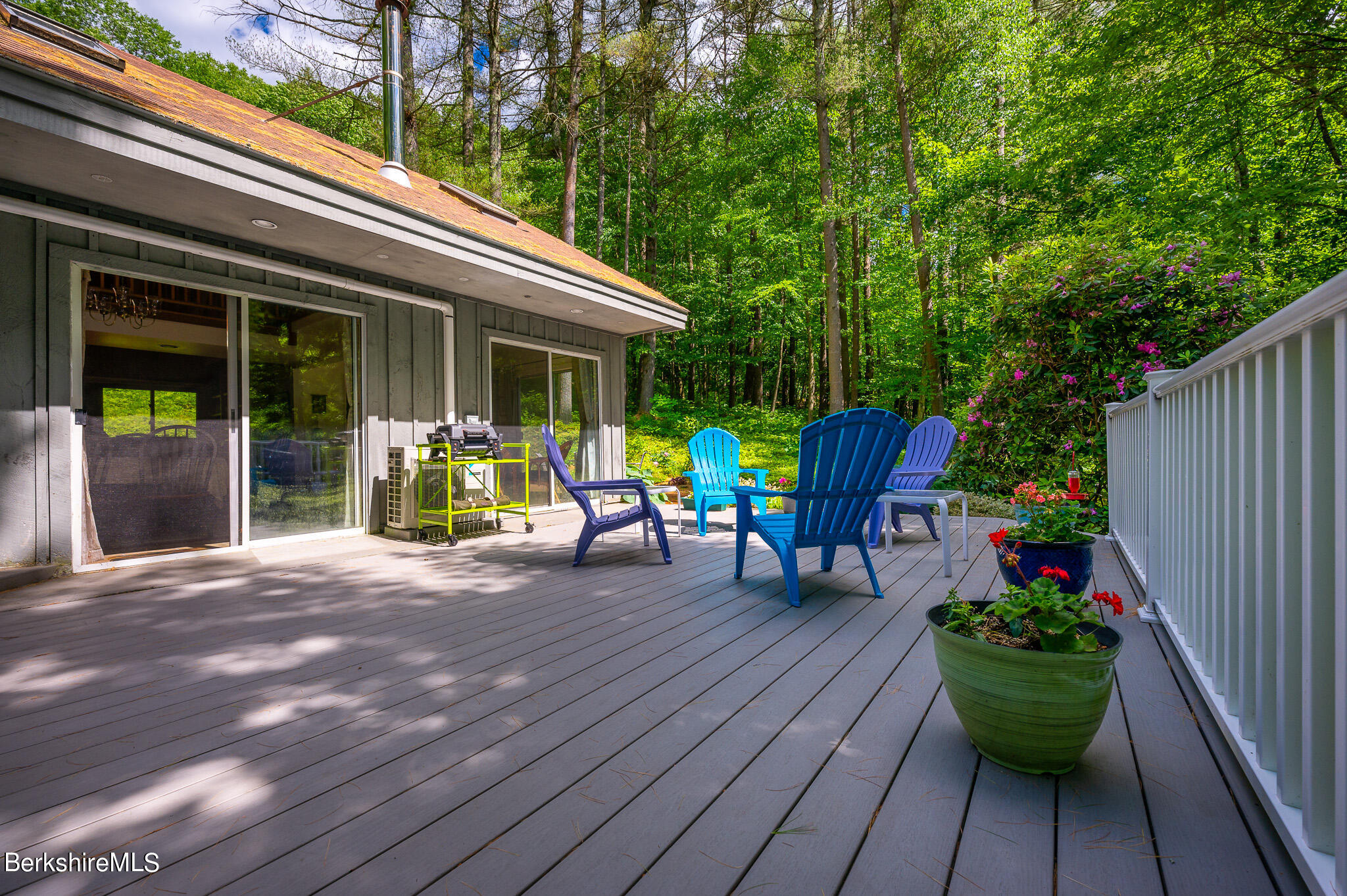 9 Pixley Hill Road West Stockbridge, MA 01236 - Photo 27 of 37 a chair and table sitting in front of a house