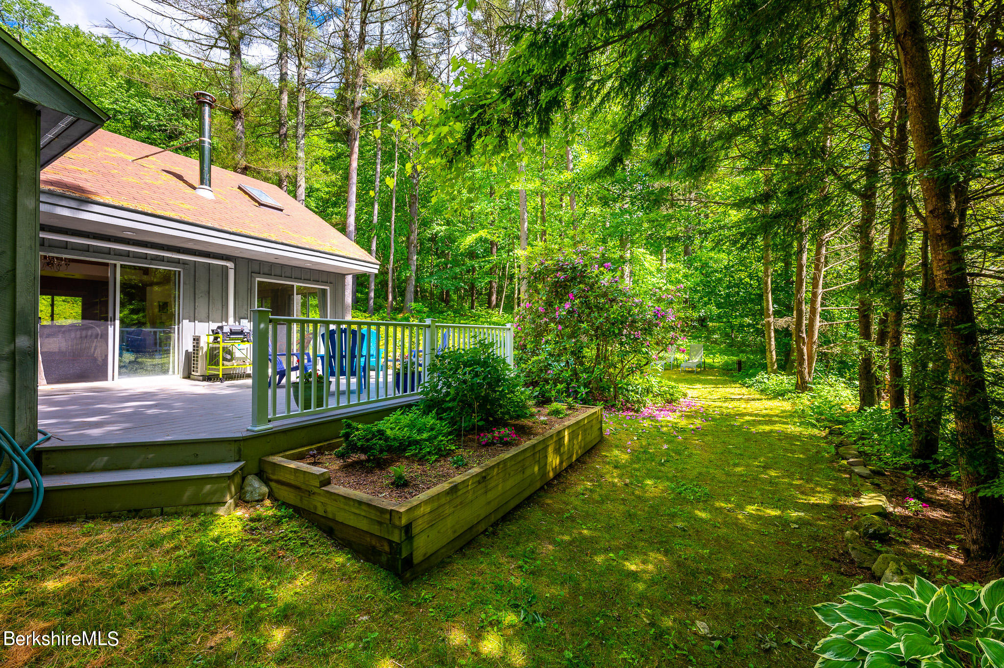 9 Pixley Hill Road West Stockbridge, MA 01236 - Photo 28 of 37 a backyard of a house with yard and outdoor seating