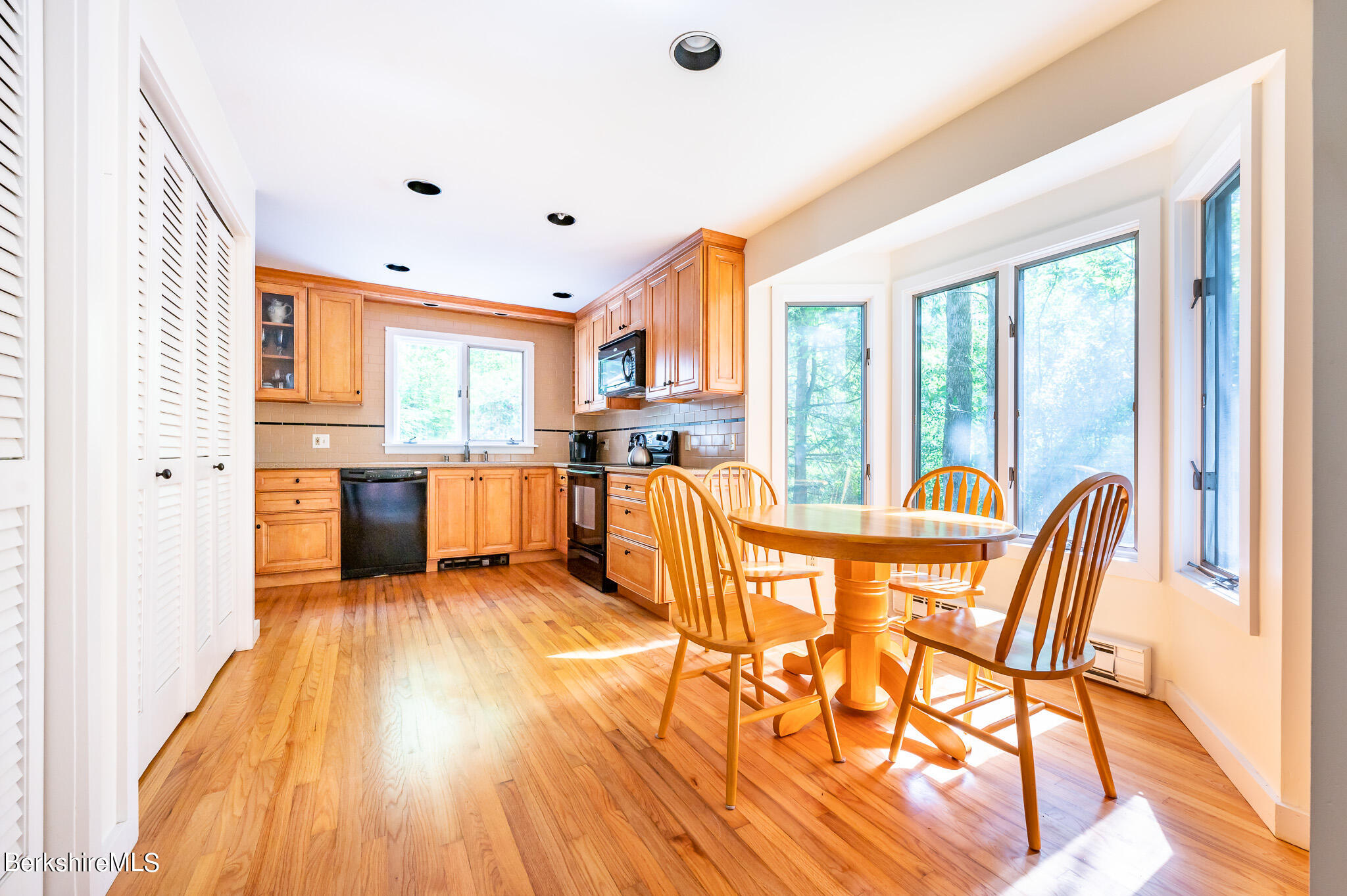 9 Pixley Hill Road West Stockbridge, MA 01236 - Photo 8 of 37 a view of a dining room with furniture a chandelier and wooden floor