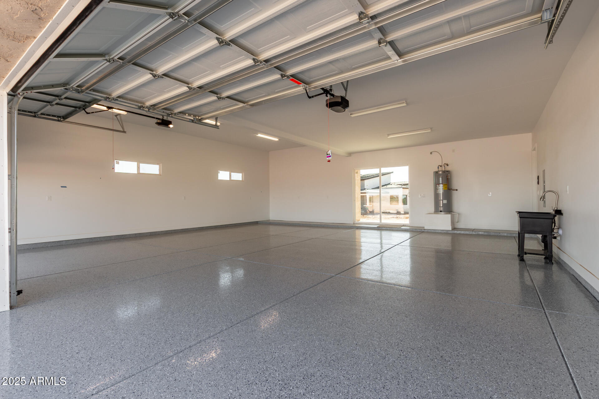 23167 West Montgomery Road Wittmann, AZ 85361 - Photo 33 of 44 a view of empty room with wooden floor