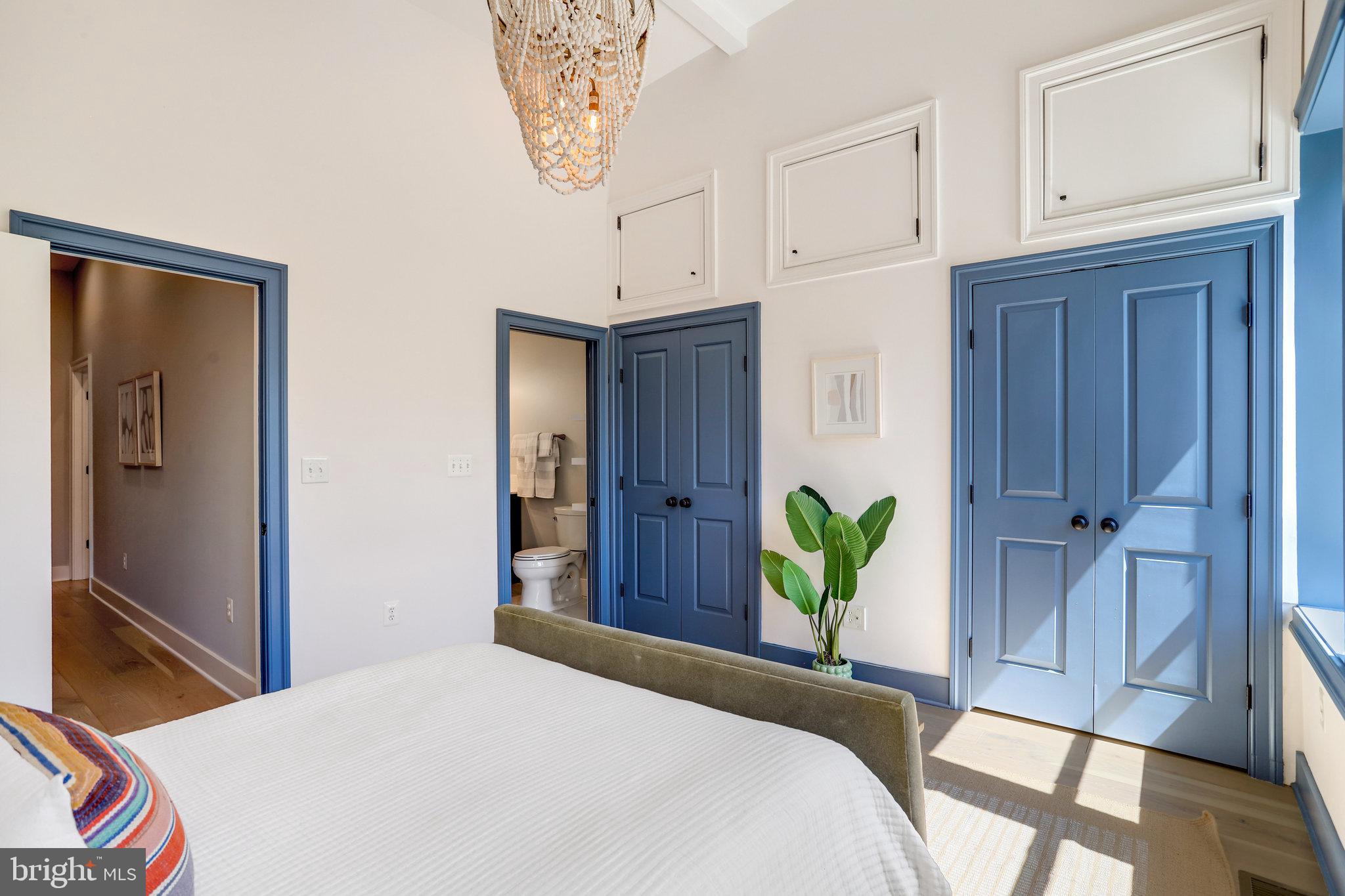 1304 E Street Northeast Washington, DC 20002 - Photo 15 of 42 a bedroom with a bed and a dresser
