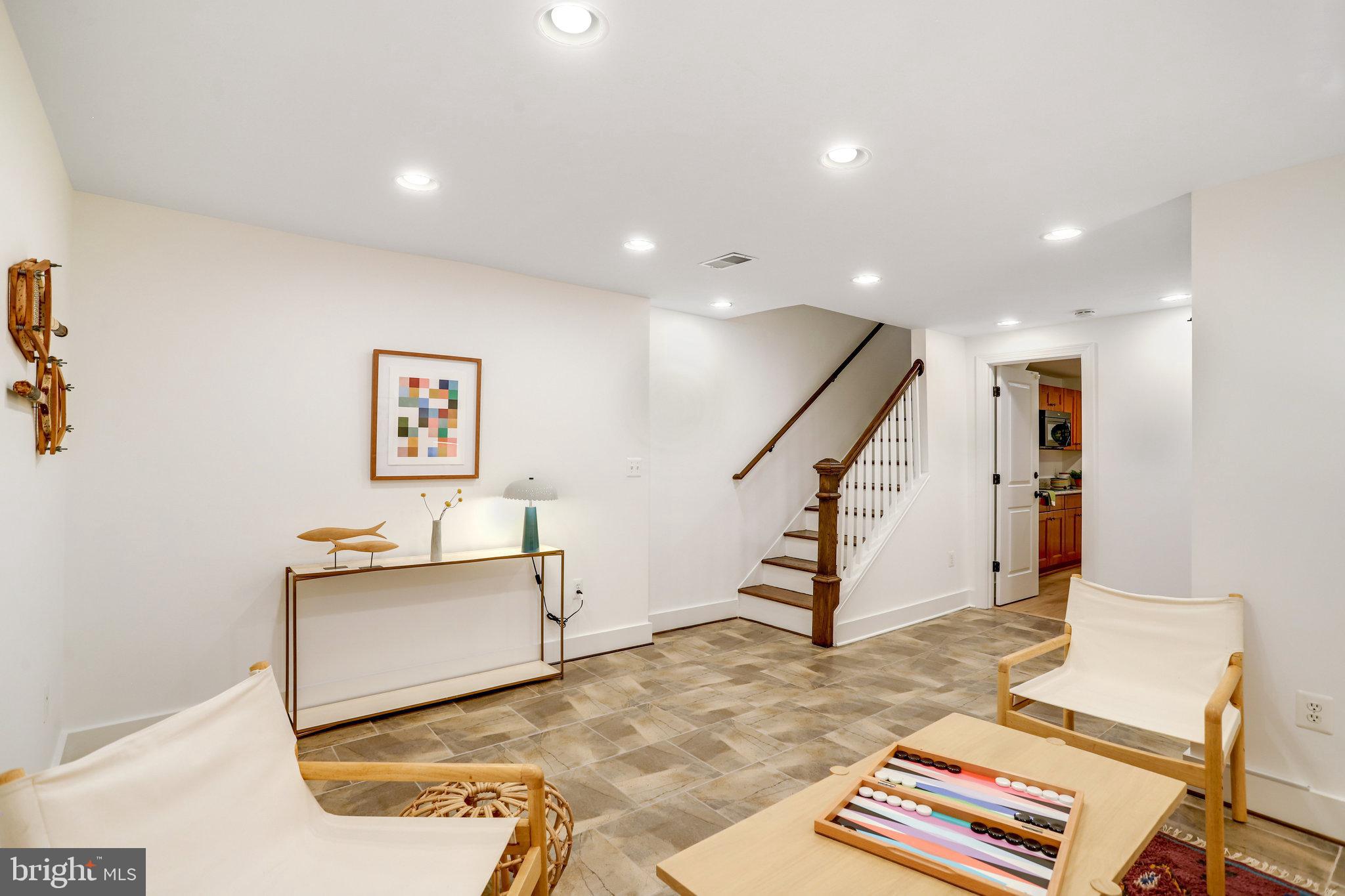 1304 E Street Northeast Washington, DC 20002 - Photo 25 of 42 a view of a hallway with wooden floor and staircase