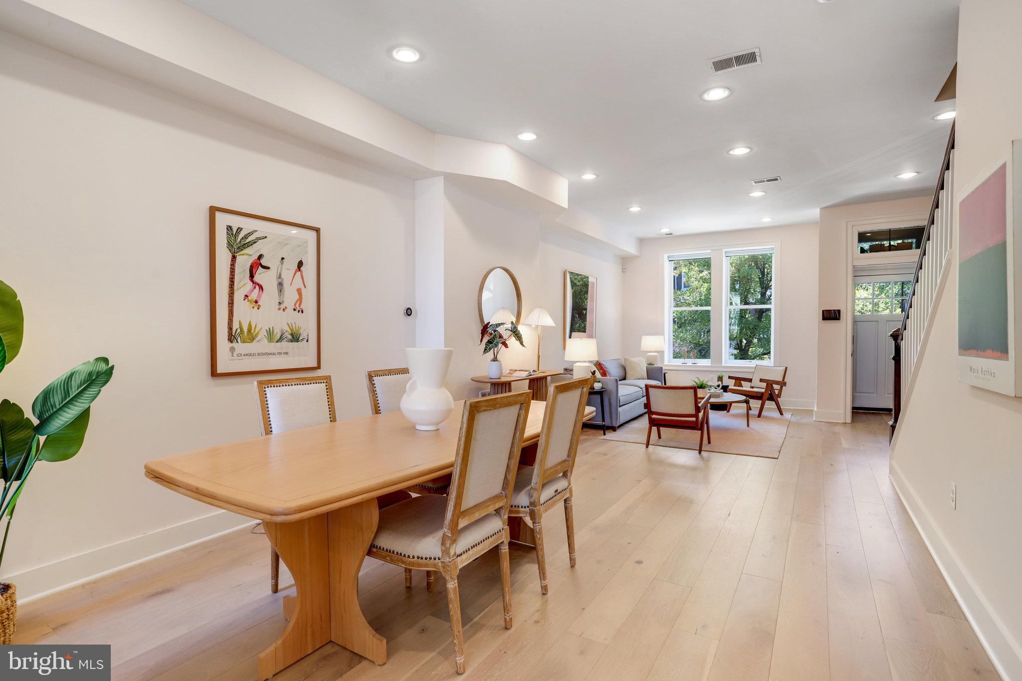 1304 E Street Northeast Washington, DC 20002 - Photo 8 of 42 a view of a dining room with furniture and a large window