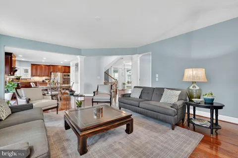 a living room with furniture and a table