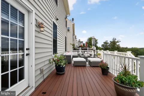 a view of balcony deck and patio