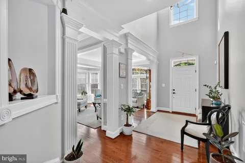 a room with furniture and wooden floor