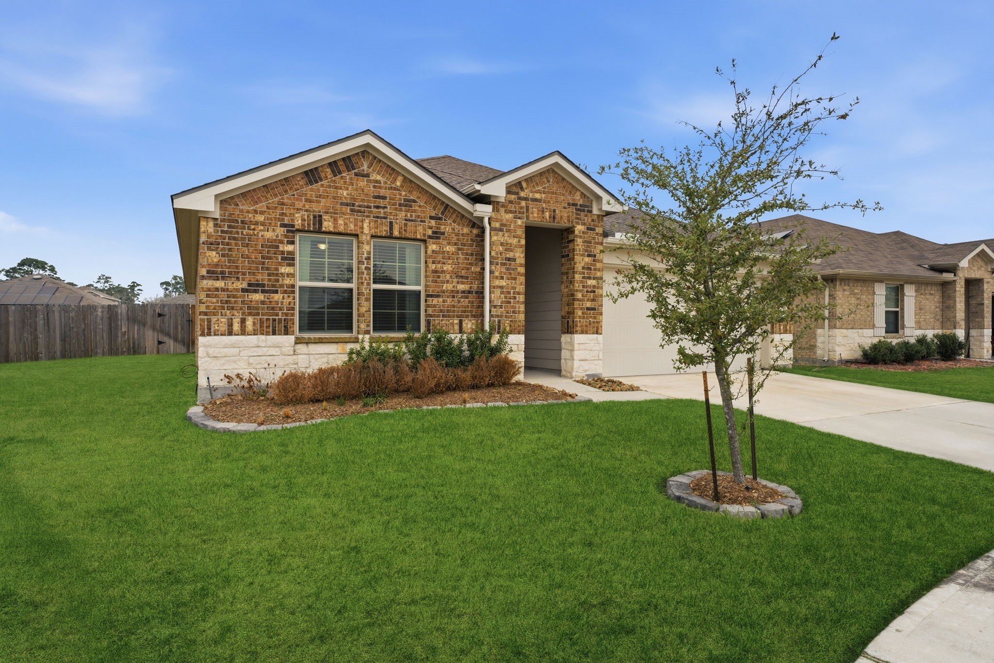 2407 Staverton Cir Spring Spring, TX 77373 - Photo 2 of 41 a view of a house with a yard and a garden