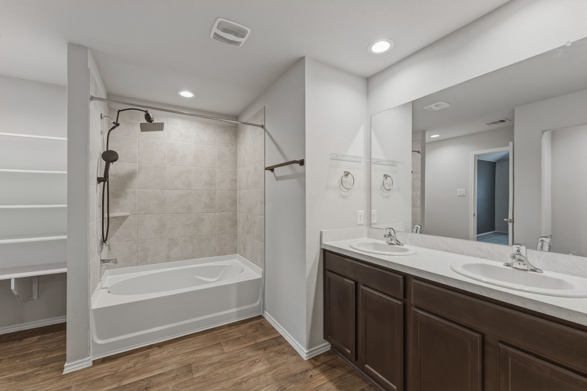 2407 Staverton Cir Spring Spring, TX 77373 - Photo 21 of 41 a bathroom with a tub sink double vanity and shower