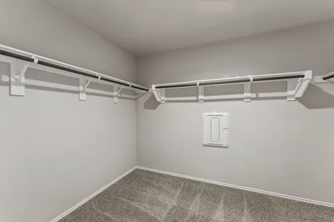 a view of a room with racks on the wall
