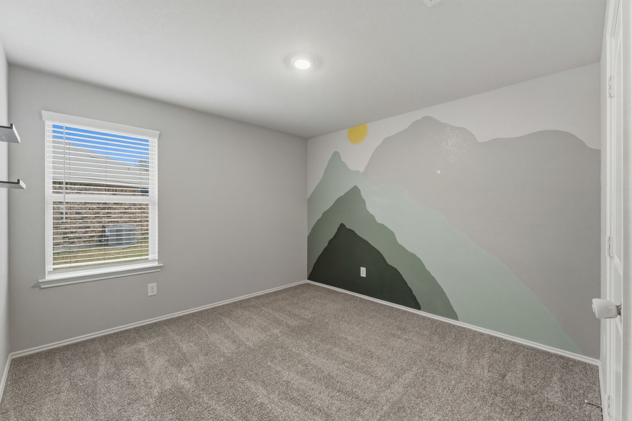 2407 Staverton Cir Spring Spring, TX 77373 - Photo 28 of 41 a view of an empty room with a window and a kitchen