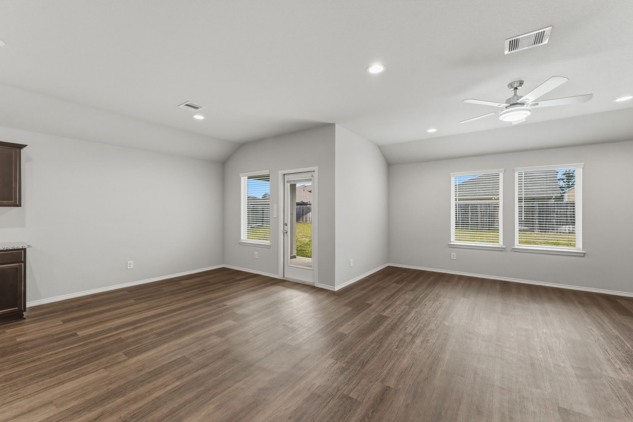 2407 Staverton Cir Spring Spring, TX 77373 - Photo 32 of 41 a view of an empty room with wooden floor and a window