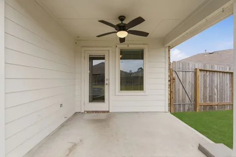 a view of entryway and hall with a wooden floor