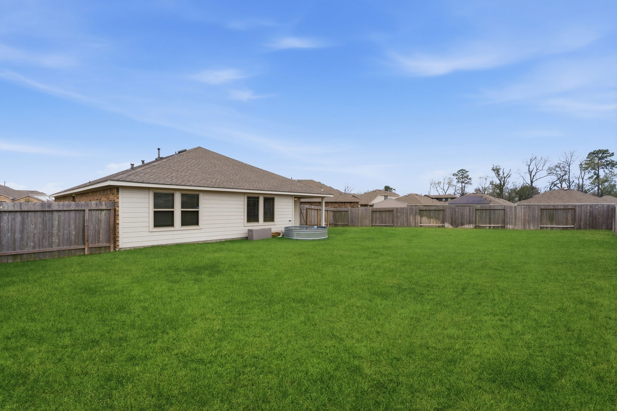 2407 Staverton Cir Spring Spring, TX 77373 - Photo 38 of 41 a front view of a house with garden
