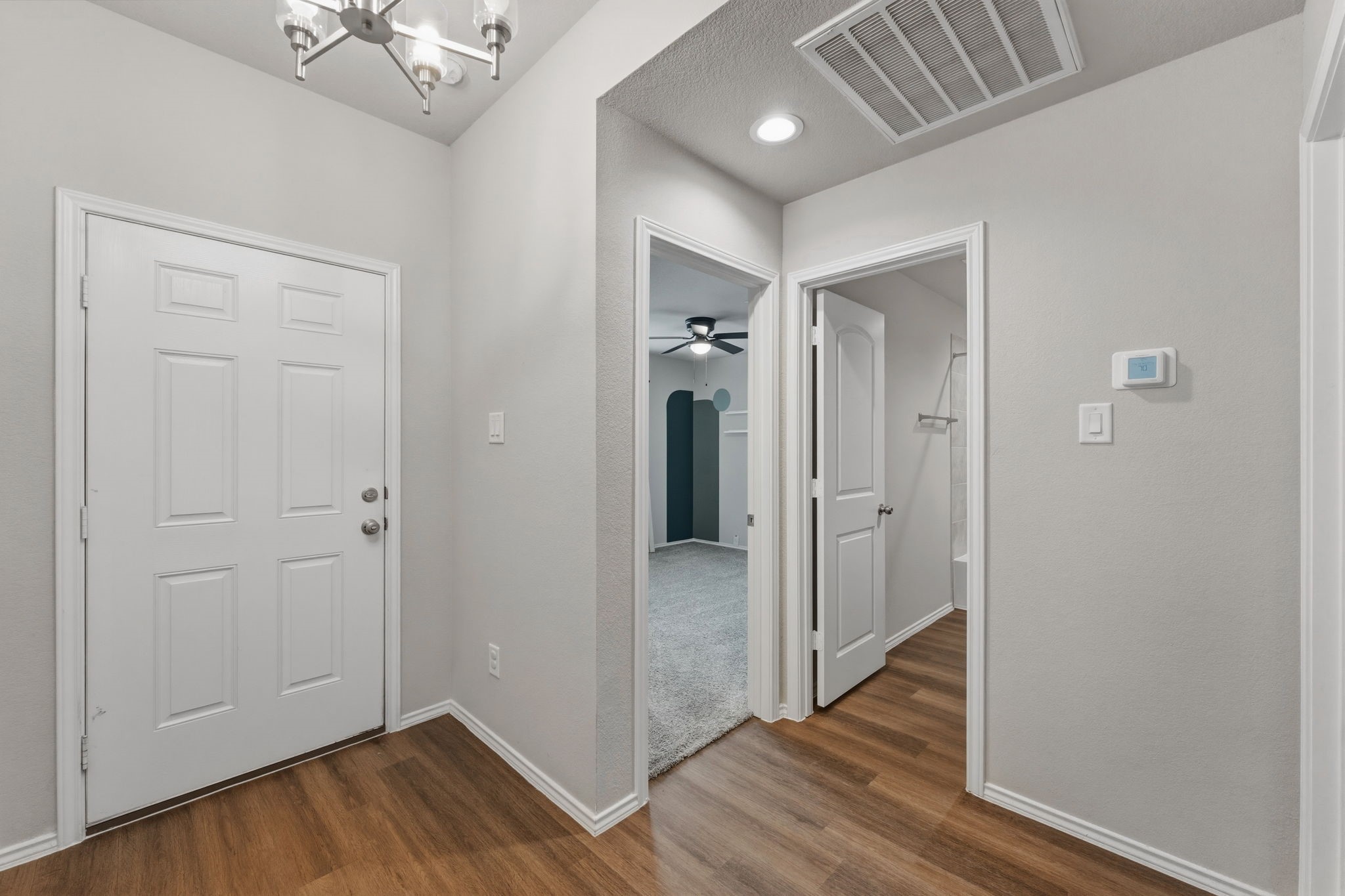 2407 Staverton Cir Spring Spring, TX 77373 - Photo 7 of 41 a view of a hallway with wooden floor