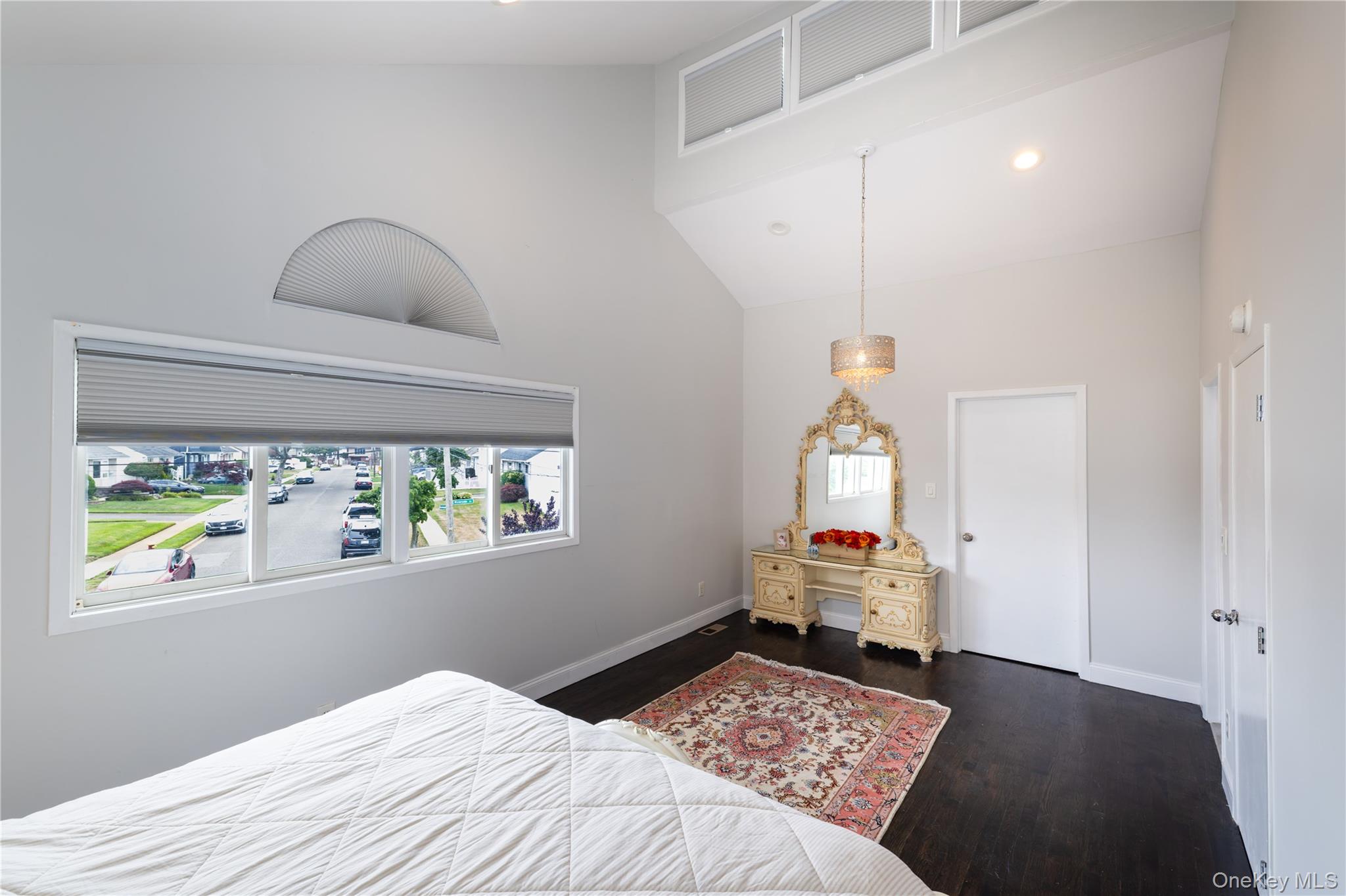 2590 Riverside Drive Wantagh, NY 11793 - Photo 9 of 27 Master Bedroom Room featuring a vaulted ceiling with recessed lighting and clerestory windows