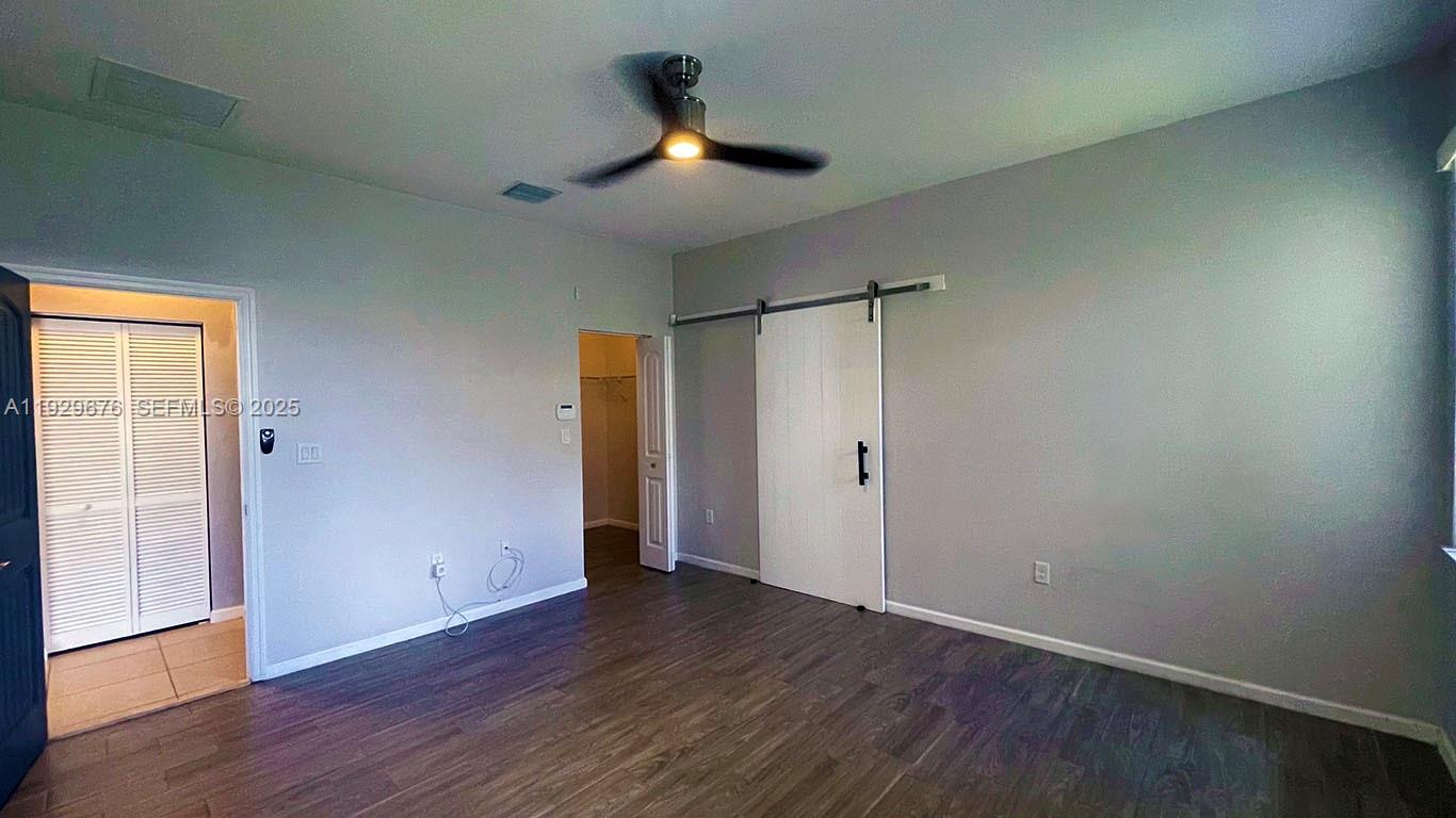 22912 Southwest 115th Court Miami, FL 33170 - Photo 23 of 29 wooden floor in an empty room