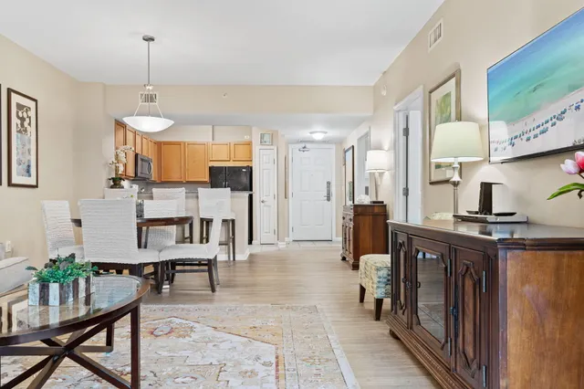 a view of a dining room with furniture window and outside view