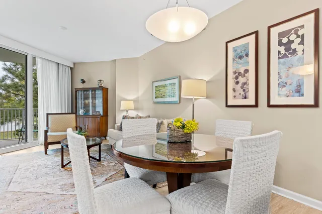 a kitchen with granite countertop a refrigerator stove and microwave
