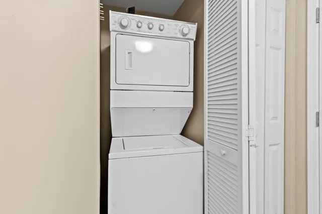 a view of a swimming pool with a yard