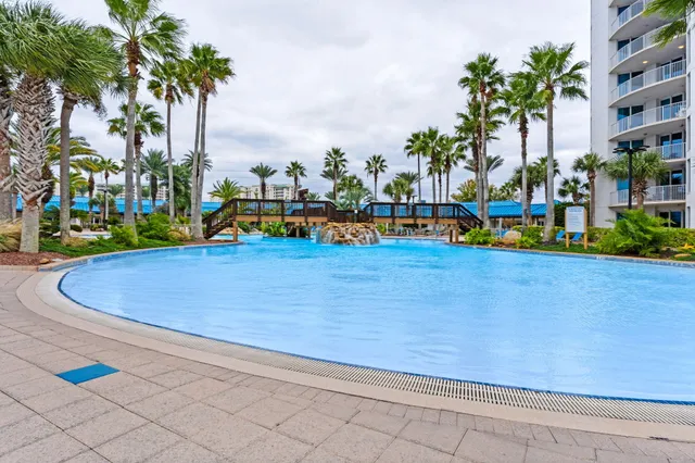 a view of an chairs and tables in the patio