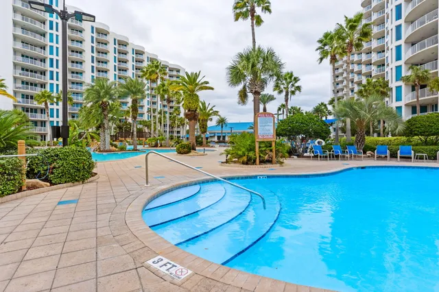 a view of a city from a hallway