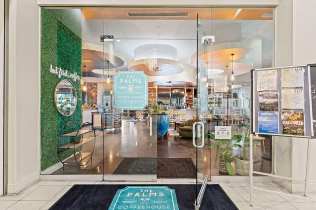 a utility room with dryer and bicycles