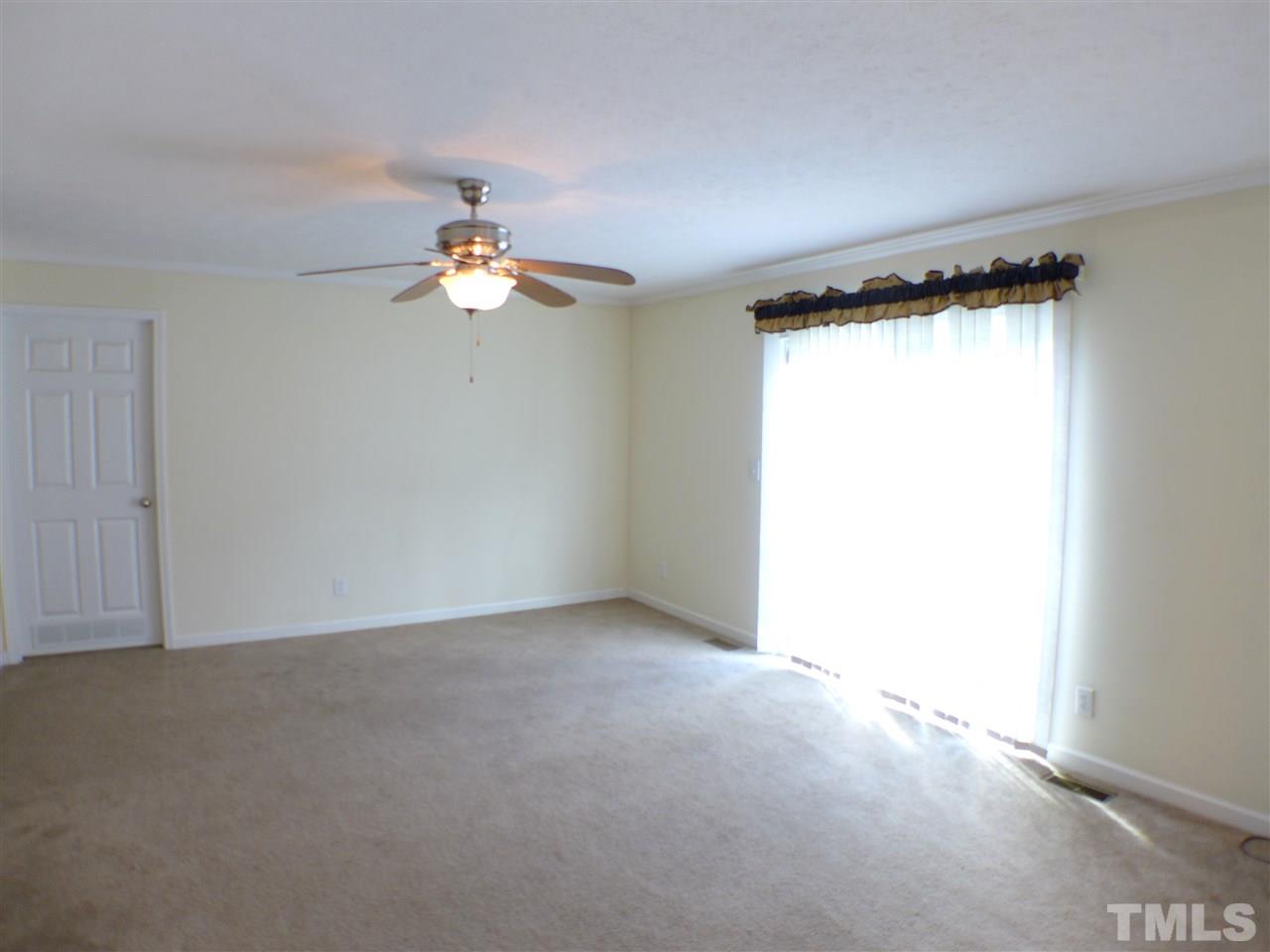 1955 Holly Grove Road Benson, NC 27504 - Photo 17 of 25 a very nice looking room with a window
