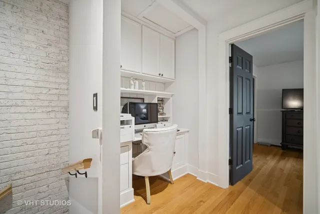 a view of kitchen with furniture and wooden floor