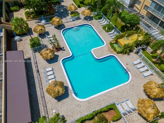 an aerial view of a swimming pool