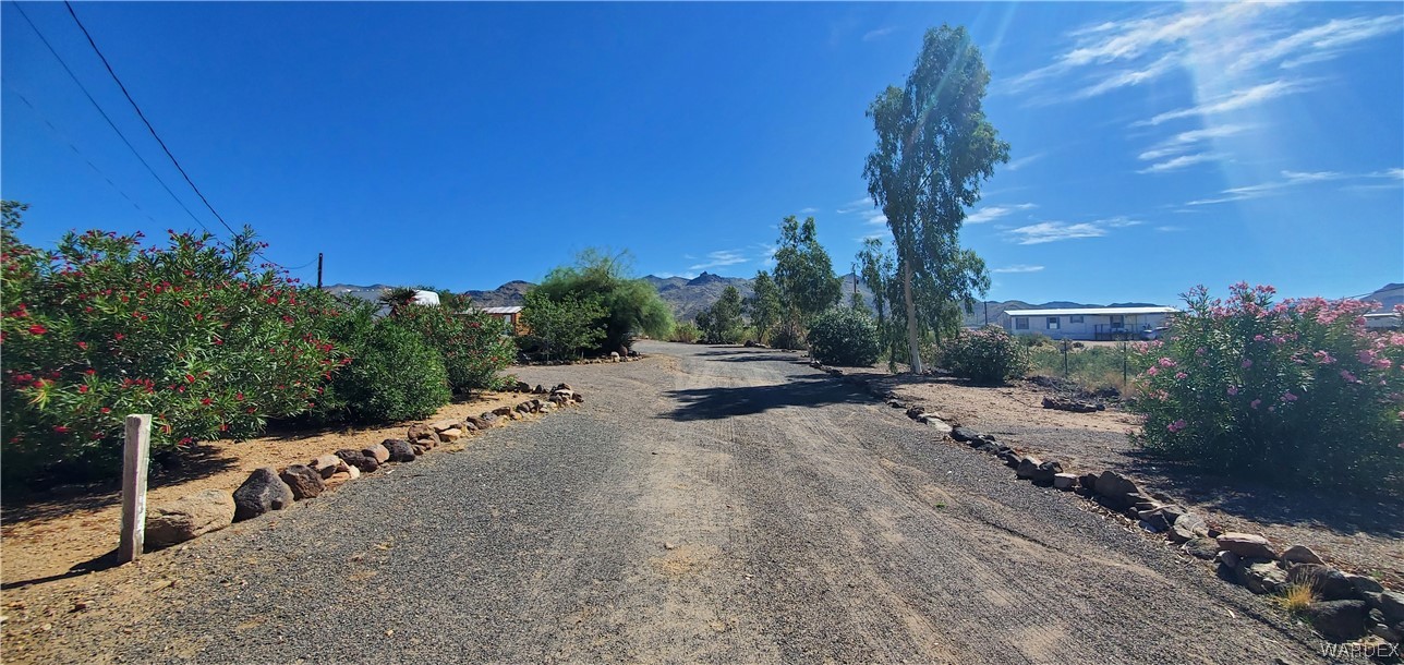 3842 Bagdad Road Golden Valley, AZ 86413 - Photo 3 of 50 a view of a road with a yard