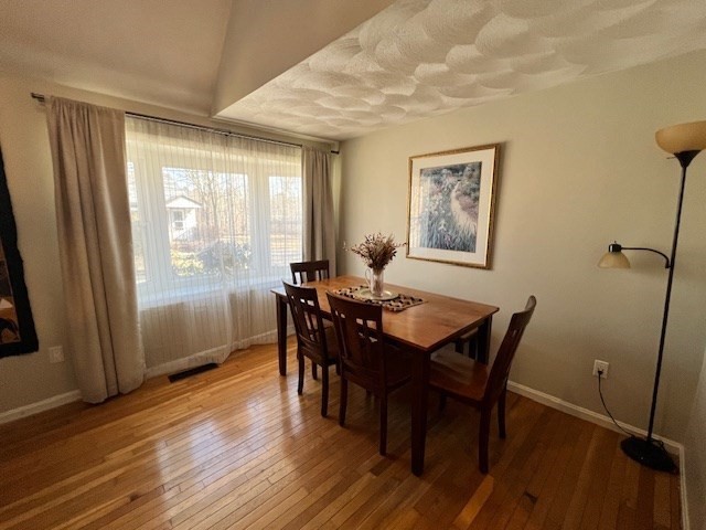 3 Pinecrest Road North Reading, MA 01864 - Photo 13 of 37 a view of a a dining room with furniture window and wooden floor