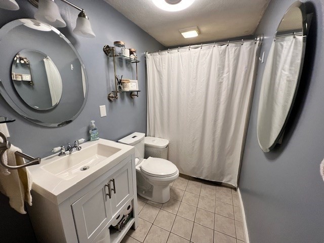 3 Pinecrest Road North Reading, MA 01864 - Photo 23 of 37 a bathroom with a toilet sink and mirror