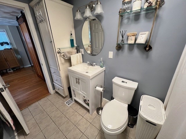 3 Pinecrest Road North Reading, MA 01864 - Photo 24 of 37 a bathroom with a toilet sink and mirror