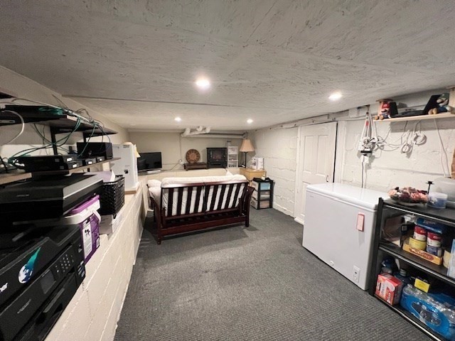 3 Pinecrest Road North Reading, MA 01864 - Photo 33 of 37 a room with furniture and a book shelf