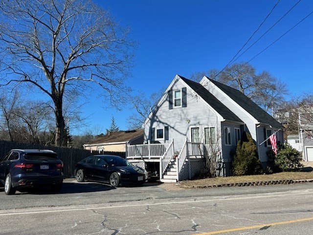 3 Pinecrest Road North Reading, MA 01864 - Photo 37 of 37 a view of a city street with a car parked on the road