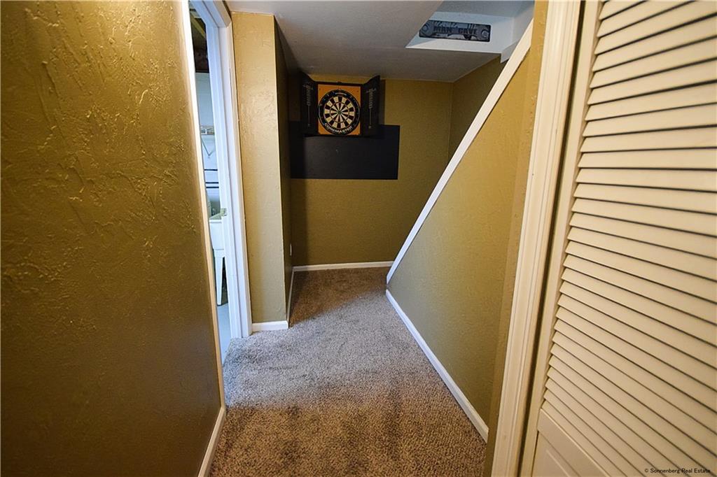 508 Countryside Drive McKees Rocks, PA 15136 - Photo 19 of 25 a view of a hallway with wooden floor and stairs