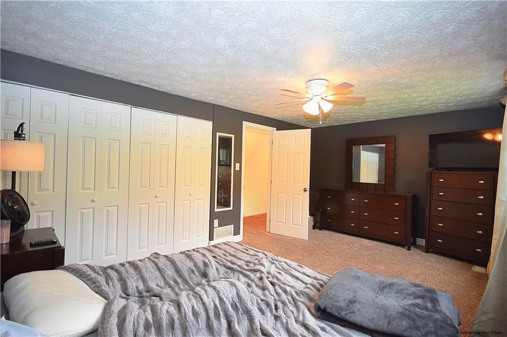 508 Countryside Drive McKees Rocks, PA 15136 - Photo 10 of 25 a bedroom with a bed and a dresser