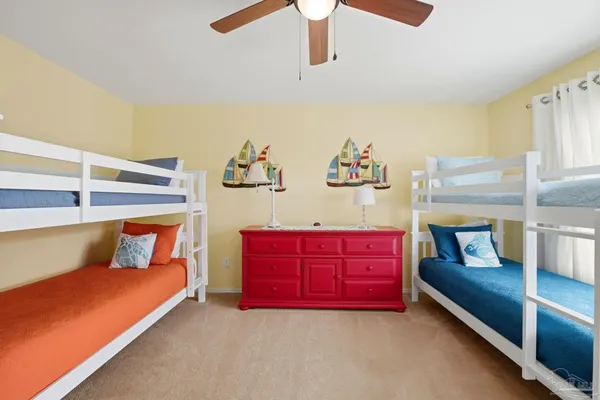 a bathroom with a sink a mirror and a shower