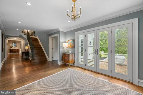 a view of front door and wooden floor