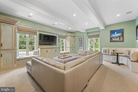 a bedroom with a bed and a fireplace