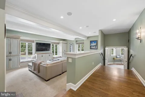 a view of a bathroom with a bathtub and shower