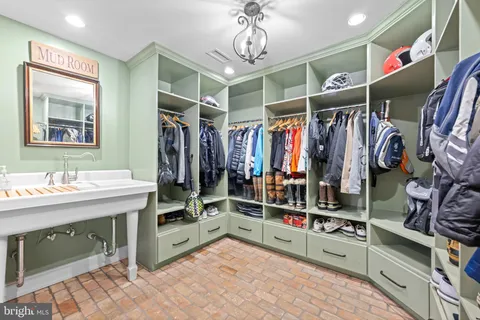 a bedroom with a bed and couch