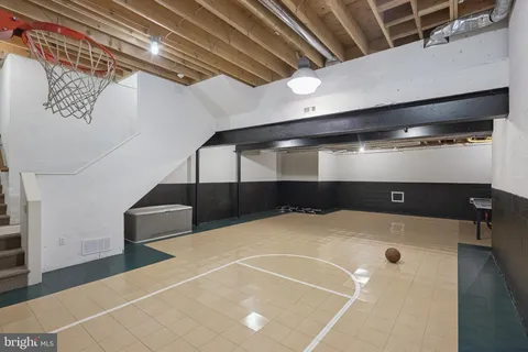 a bathroom with a sink a toilet and a bathtub